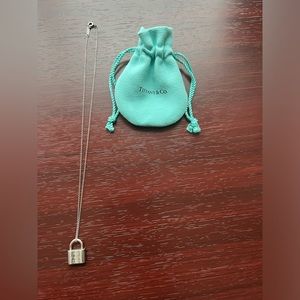 Return to Tiffany & Co Lock Pendant Necklace.